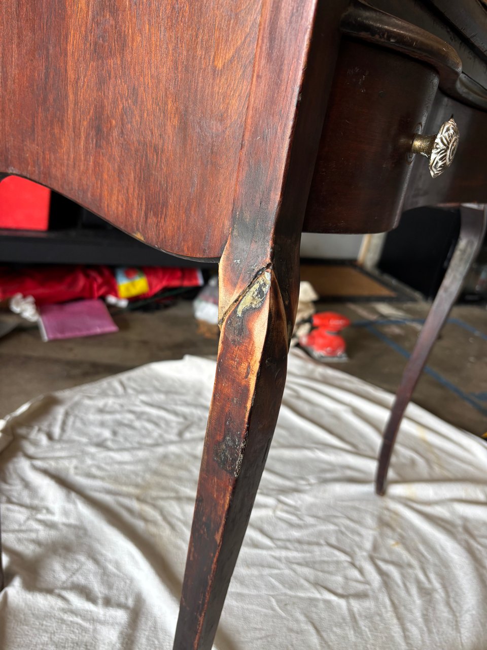 close up shot of antique wooden desk leg