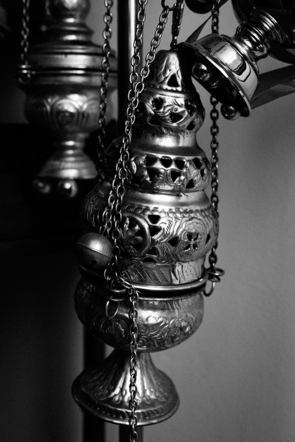 A black and white picture of a censer.