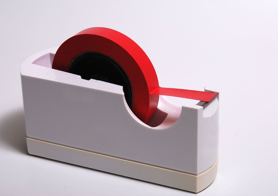 Paper tape table dispenser by Lilly M is licensed under the Creative Commons Attribution-Share Alike 3.0 Unported Paper tape table dispenser