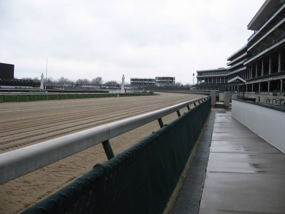 Churchill Downs, empty track and grandstand, after rainy morning. Taken by jdeames March 2007.