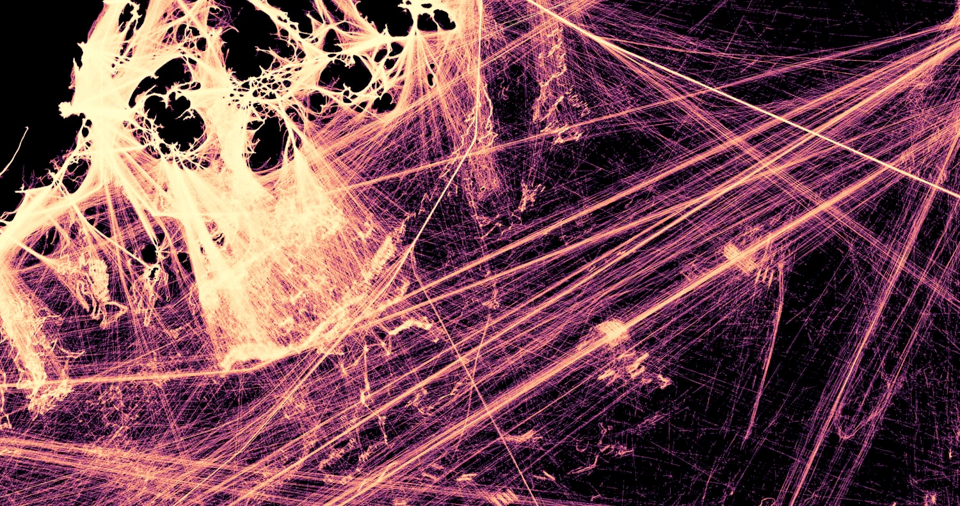 A screenshot of a data visualization that appears to be thousands and thousands of bright lines – bright yellow against a black background. The origin of the lines cluster around curved edges of black background space which make shapes that look like coastlines – and then shoot outwards from them into the darker area of the ocean