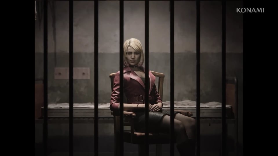 Maria looking at James from inside her cell