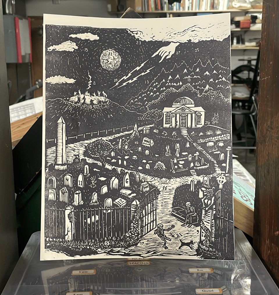 A letterpress block print of a graveyard and mausoleum