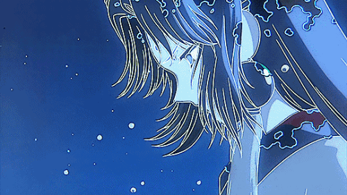 An animated GIF of a character from the anime series "Cardcaptor Sakura" slowly becoming part of a monochrome blue palette.