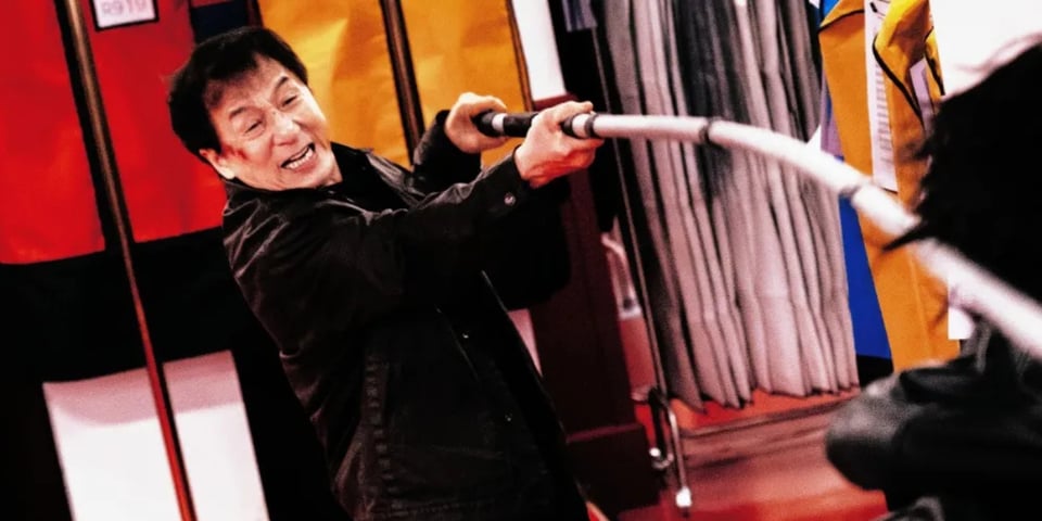 Jackie Chan and his scaffolding pole.