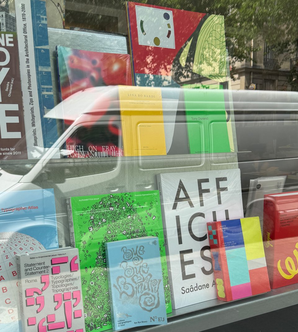 books of various sizes and colors in a store window