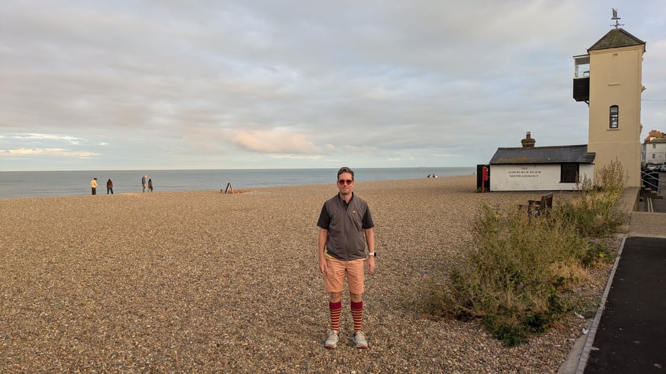 Me on Aldeburgh beach, sporting mandatory long socks in Aldeburgh red/yellow stripe club colours, South Lookout behind