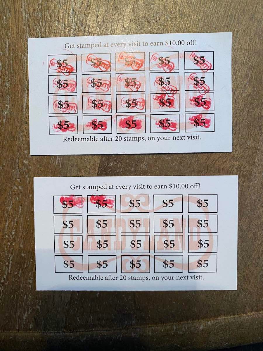 a full and in-progress stamp card for each $5 of purchase you earn a stamp at candyland