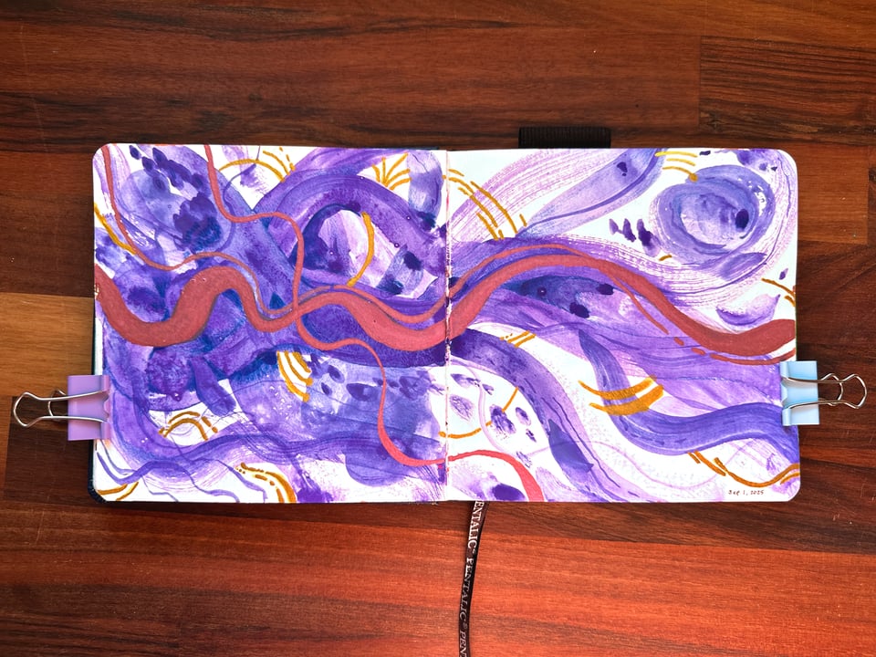 An abstract painting in hues of purple, pink, and gold across two pages in a sketchbook. The energy is wild and uncontained, with the brushstrokes varying in size and texture. It looks a bit like chaos.