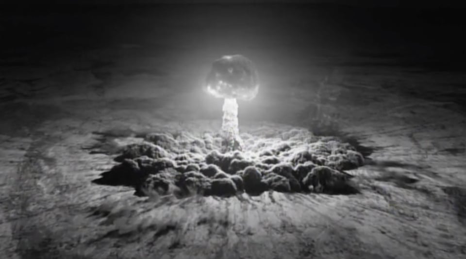 black and white image of the Trinity bomb test
