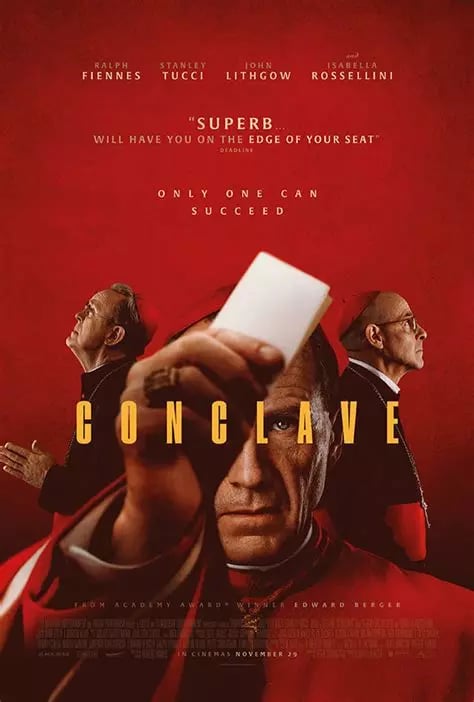 Alt text: Movie poster for "Conclave" with a rich red background. It features the faces of Ralph Fiennes, Stanley Tucci, and John Lithgow arranged in a collage. The poster shows a white ballot paper being held up. Text includes "SUPERB - WILL HAVE YOU ON THE EDGE OF YOUR SEAT" and "ONLY ONE CAN SUCCEED" above the large gold title "CONCLAVE." The top lists the starring actors and notes it's from Academy Award winner Edward Berger.