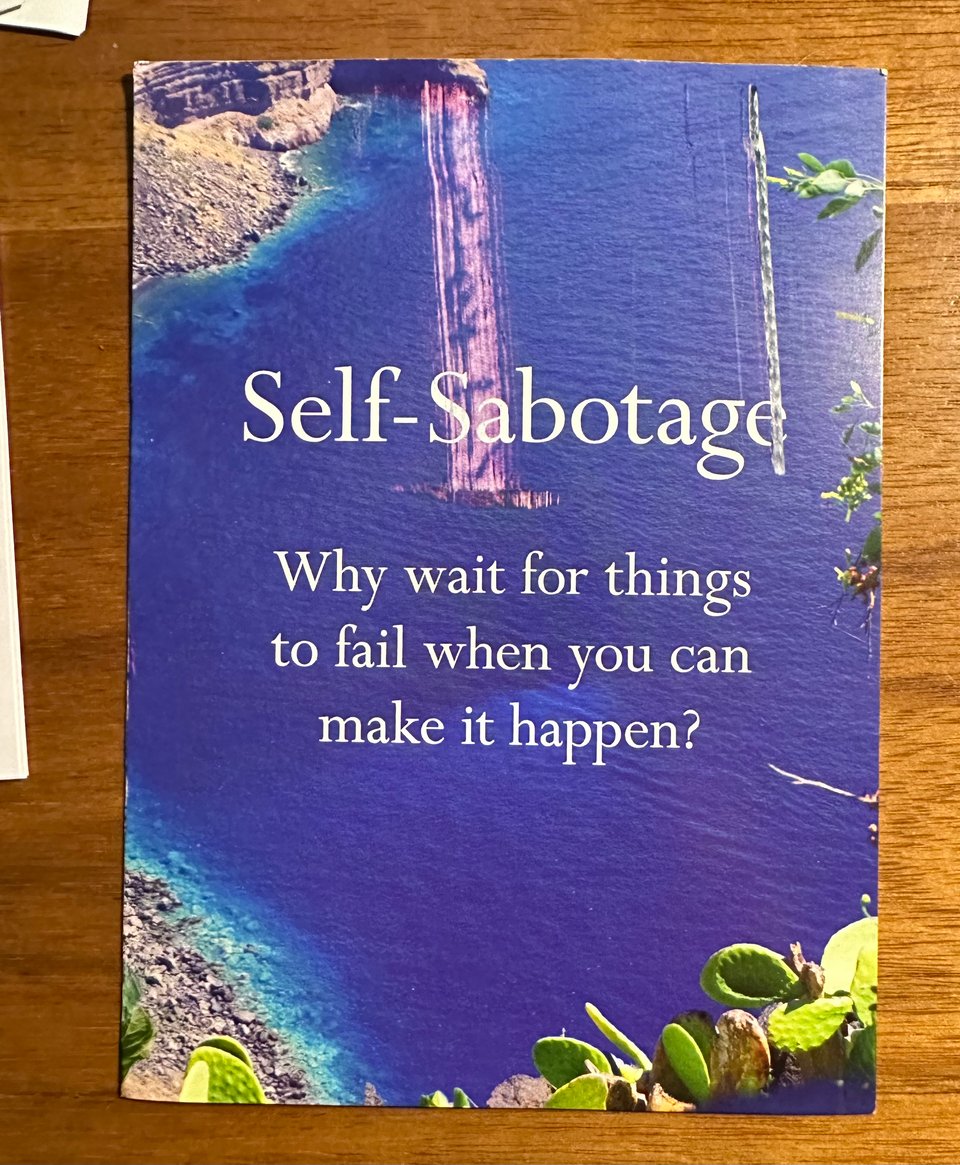 Postcard featuring an aerial photo of the sea and the text "Self-Sabotage: Why wait for things to fail when you can make it happen?"