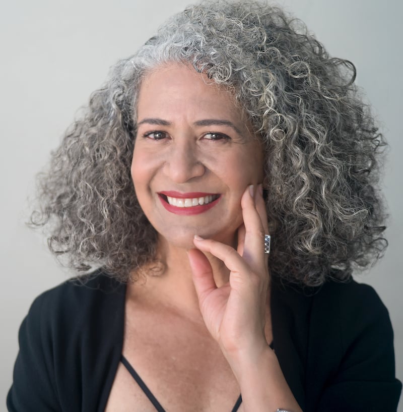 a woman with curly hair