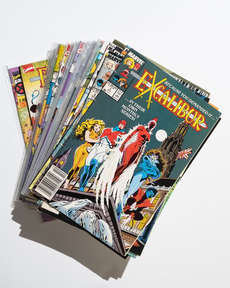 a stack of Excalibur comics from 1-34. Issue 1 of the series is on top