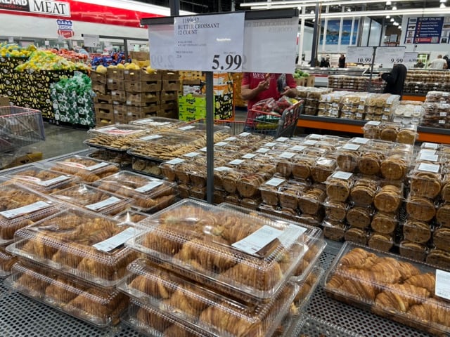 clear clamshell boxes of croissants stacked up, 5.99