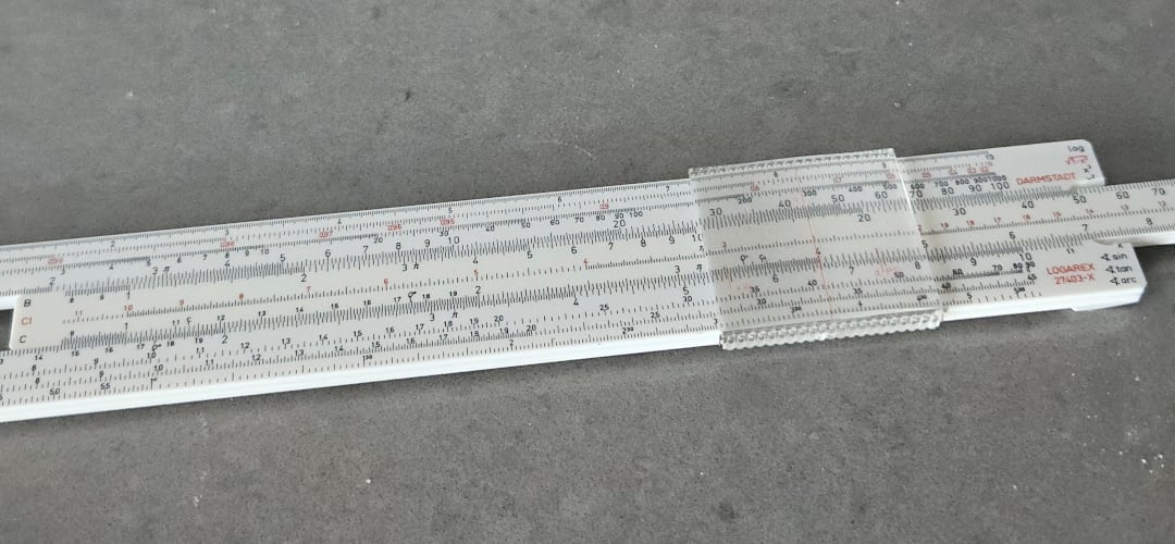 The slide rule goes in the kitchen