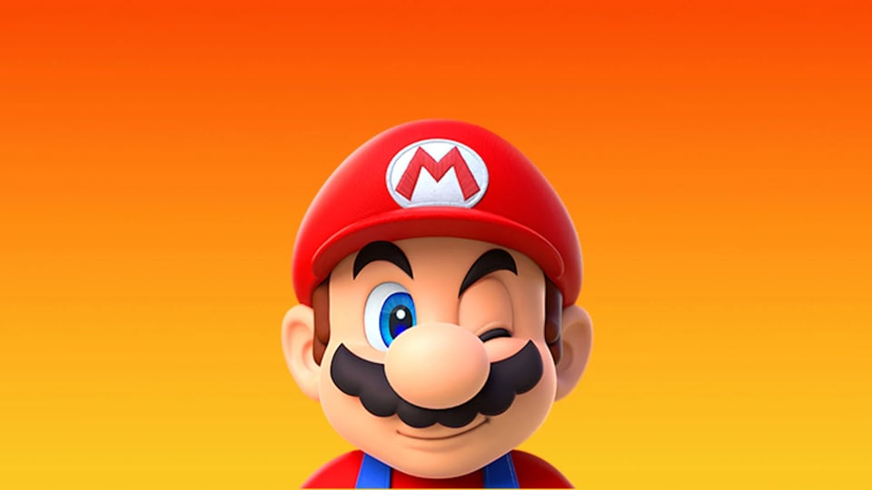 Classic video game character Mario winks, in front of a orange-yellow gradient background