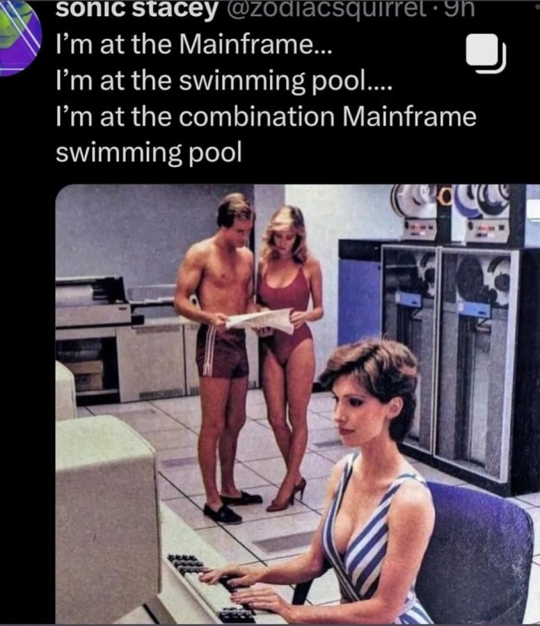 @zodiacsquirrel: I'm at the Mainframe... / I'm at the swimming pool.... / I'm at the combination Mainframe swimming pool // Below is a photo of three people wearing 80s (?) style swimwear. A woman in the foreground sits at a computer while a man and woman stand in the background looking at paperwork near some large mainframe boxes.
