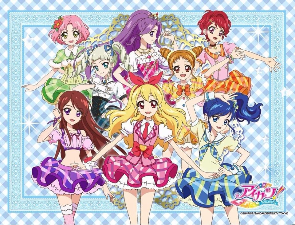 Promotional image for the anime Aikatsu! with the main heroine, Ichigo, in the front and center of the photo surrounded by other idols in the series.