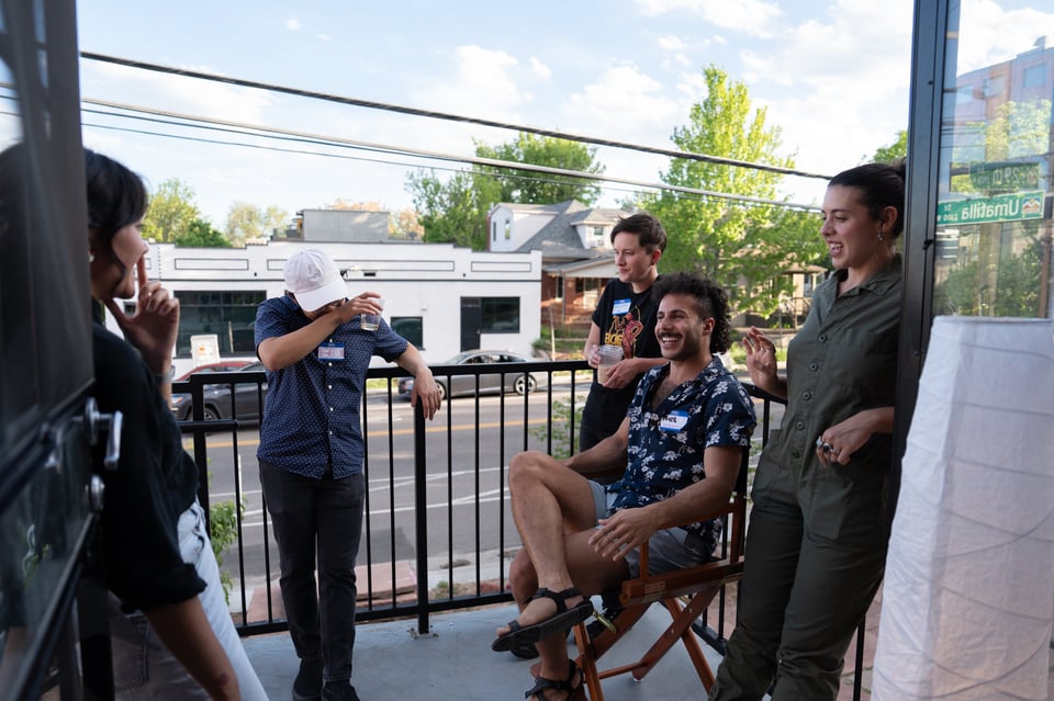 People standing on the porch.