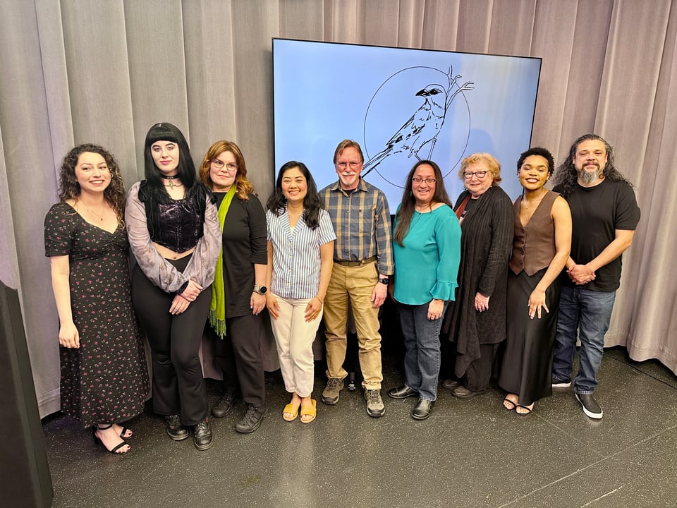 Group photo of Wild Blue Zine volume 2 contributors, inside the CMAC TV studio.
