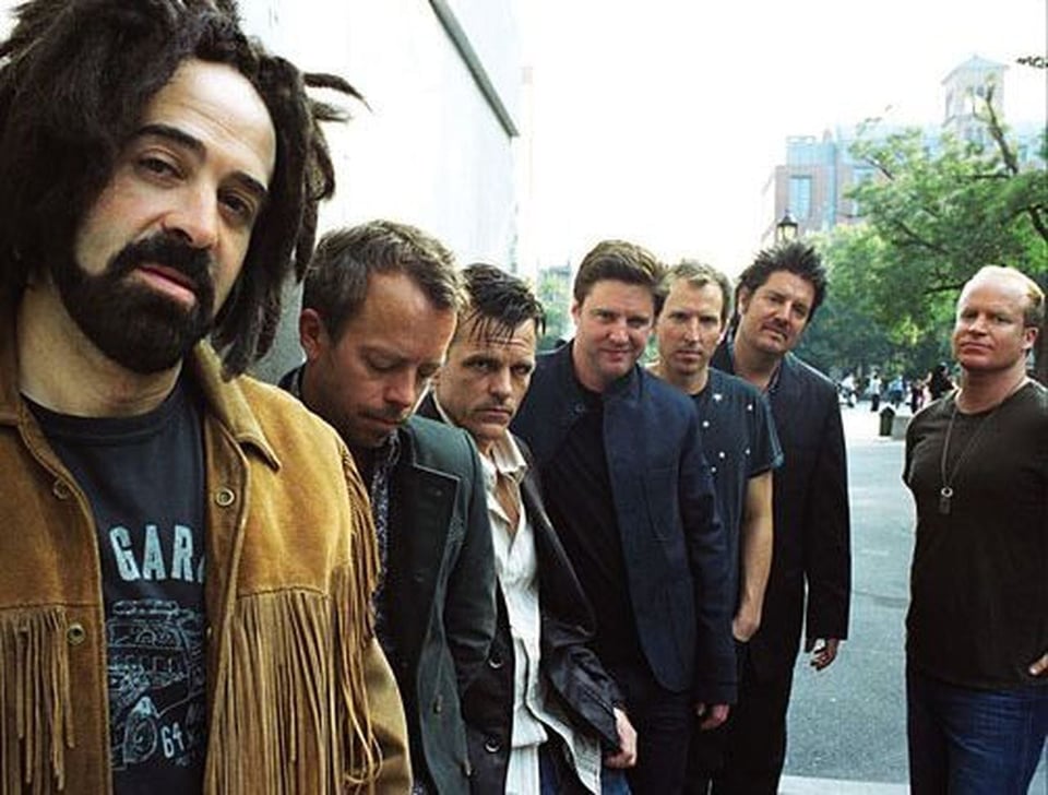 Photo of Counting Crows, the band. The lead singer has hair extension that give him dreadlocks