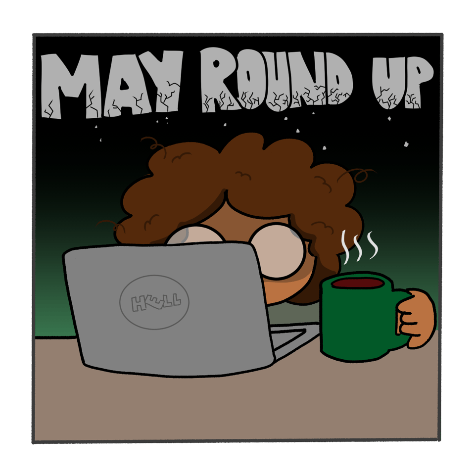 Vincent sits at their laptop in deep focus with a cup of coffee in hand.