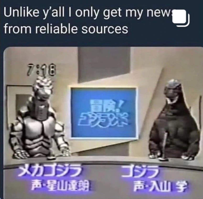 Top text reads: Unlike y'all I only get my news from reliable sources. Image below is of Mechagodzilla and Godzilla standing at a counter on a TV set that resembles a lite news show.