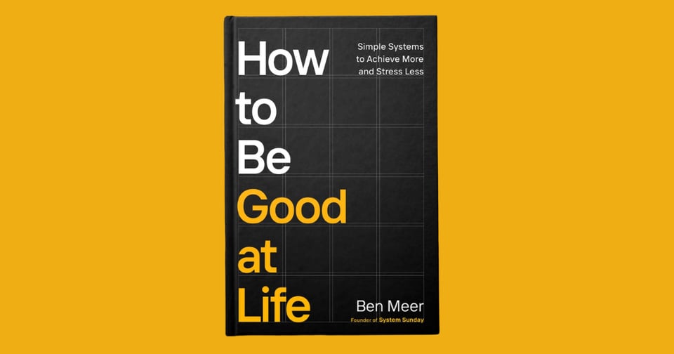 A stark black, white and orange book cover proclaims "How to be Good at Life".
