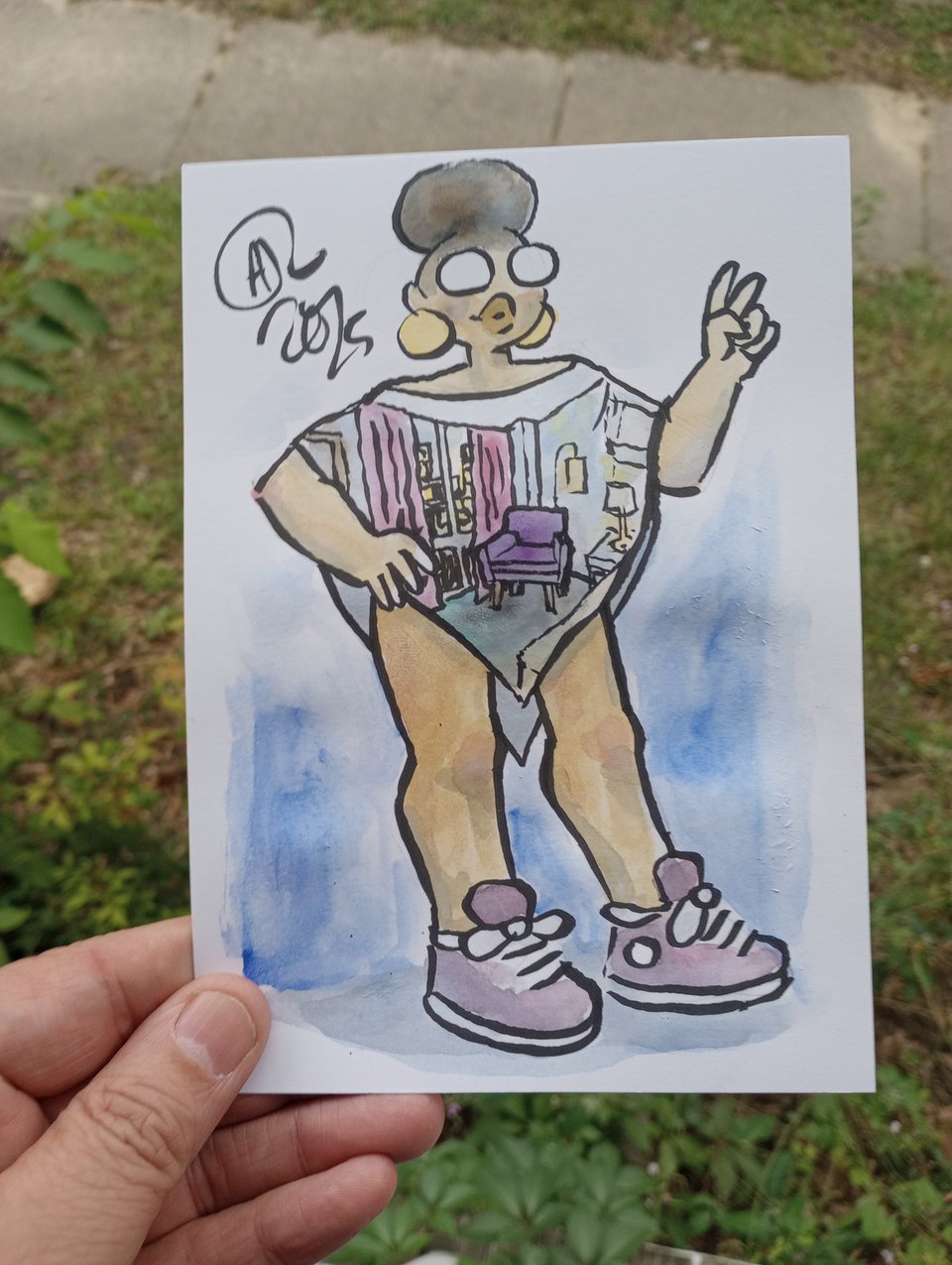 A watercolor of Val in a poncho with the image of a hotel cuck chair printed on it