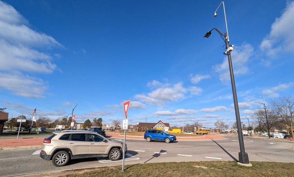 cars at the roundabout at State Street and Ellsworth Road in Ann Arbor, Michigan