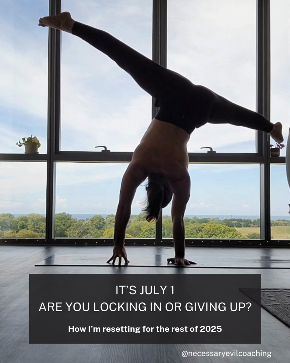 Sirus practices a one-arm handstand shift in a room with floor-to-ceiling windows, asking whether you will also reset your intentions for the rest of 2025