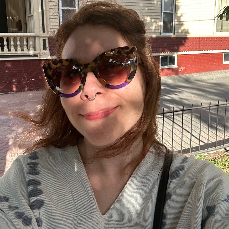 kate smiling at the camera