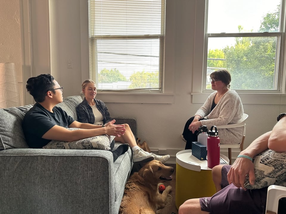 Four people allegedly having a conversation.