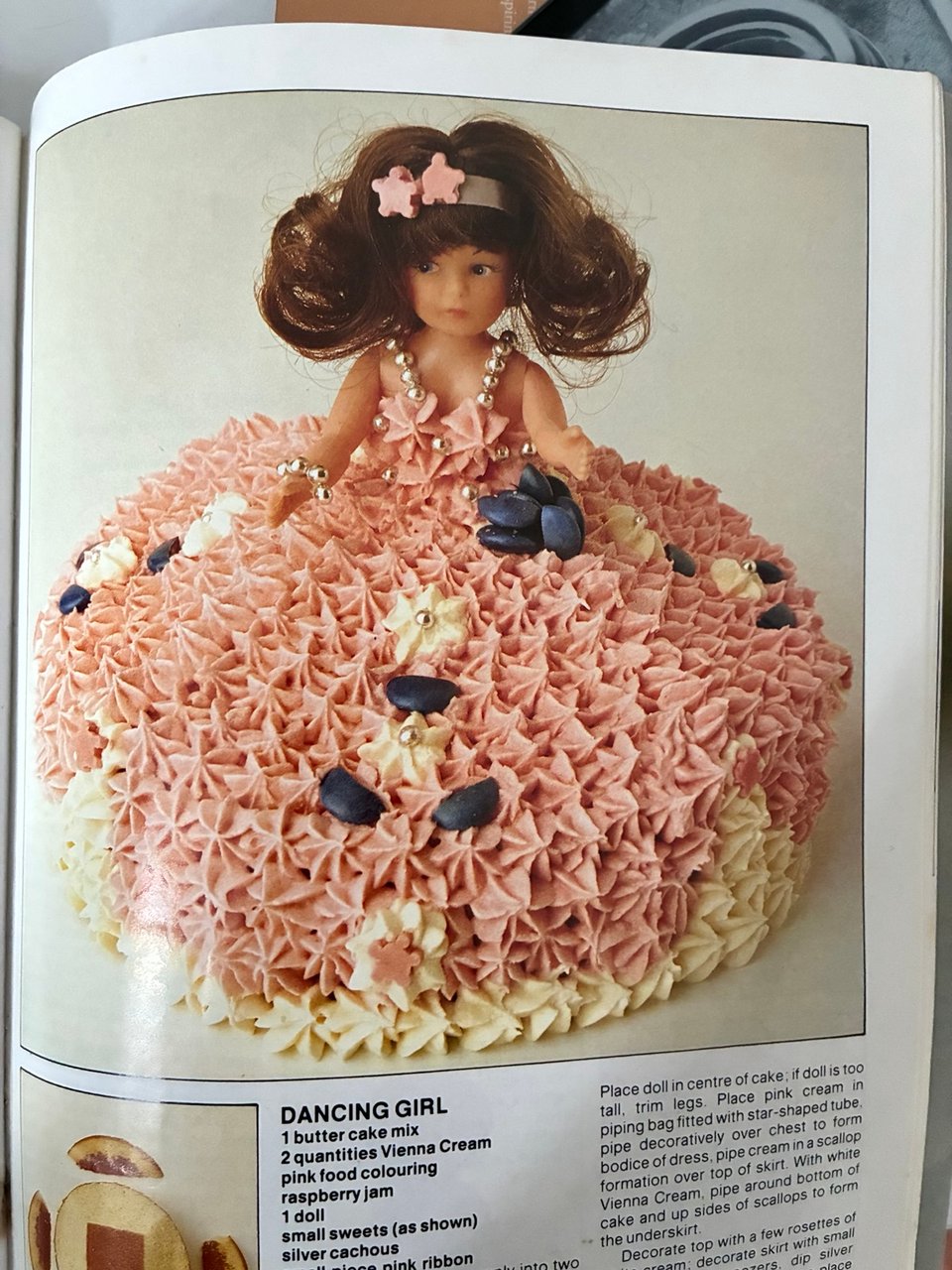 cake with a doll at its centre