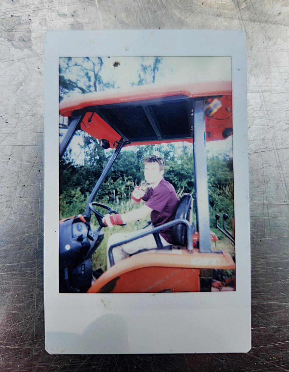 Hayden on the tractor