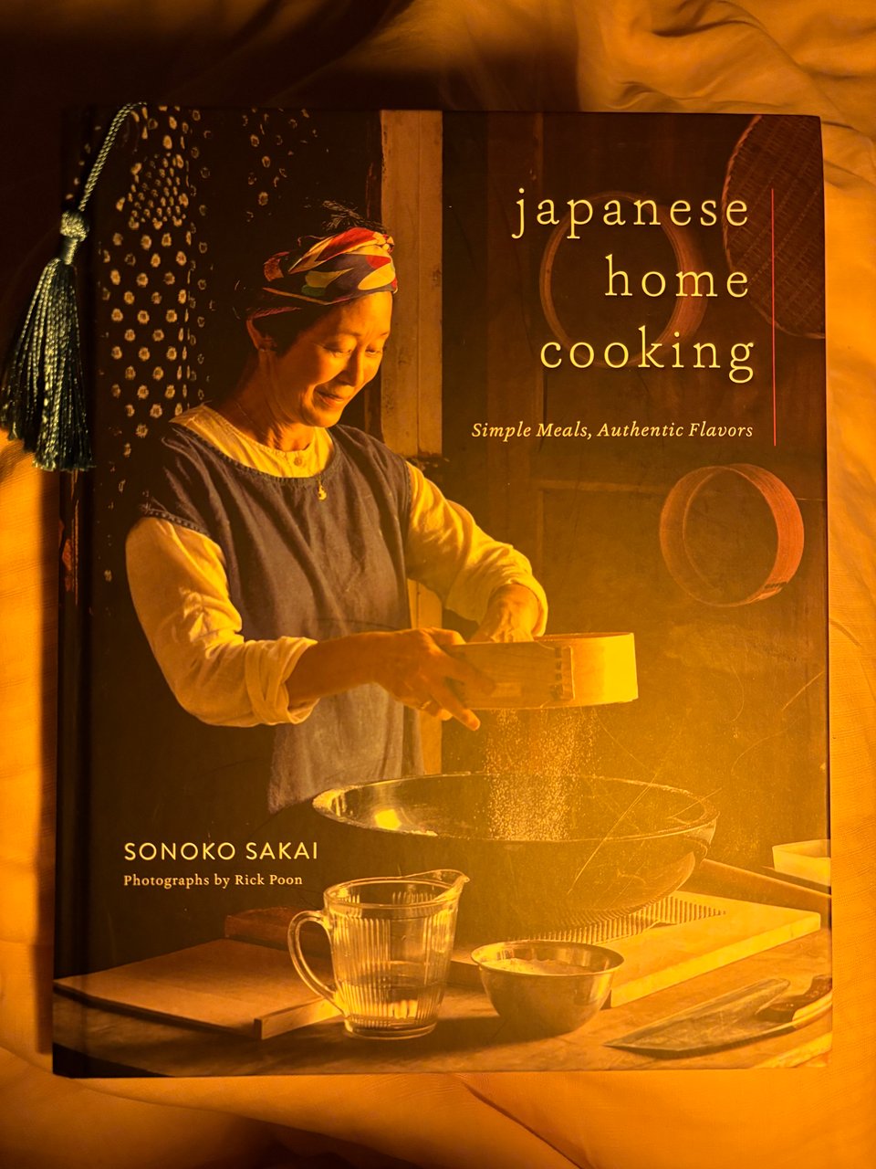 The front book cover of Sonoko Sakai’s Japanese Home Cooking: Simple Meals, Authentic Flavors.