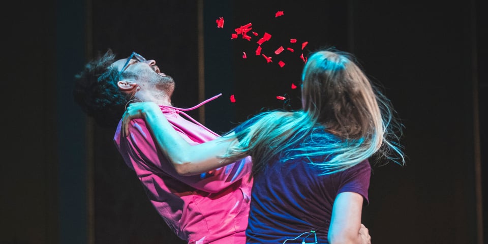 Dan gets punched and red confetti flies everywhere.