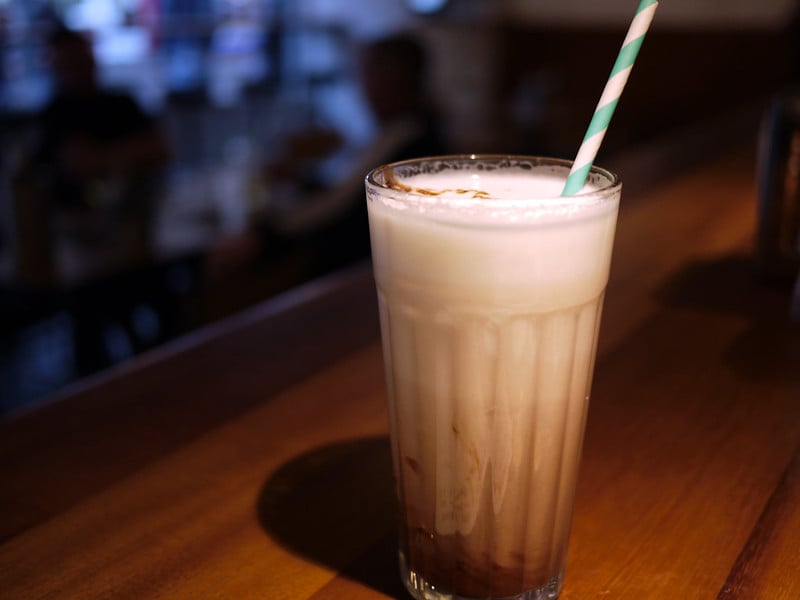 Image of a clumsily-made egg cream without a distinct head.