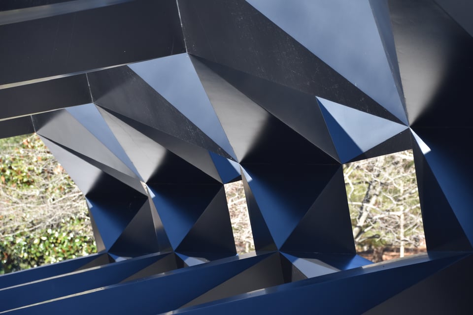 a dark gray metal structure