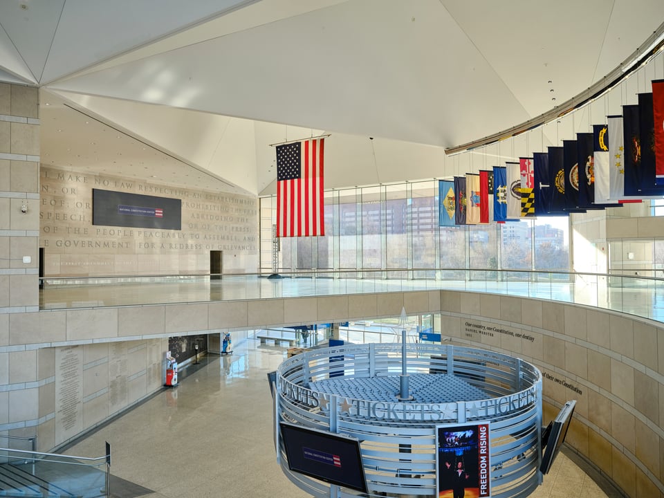 The Grand Hall Overlook features flags representing each state in order of when they joined the Union.