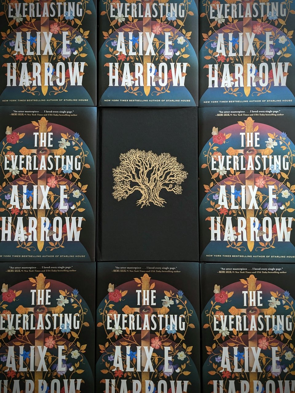 a slightly arty picture of my book, arranged around one copy with the jacket taken off so you can see the beautiful foil case stamp of a tree.