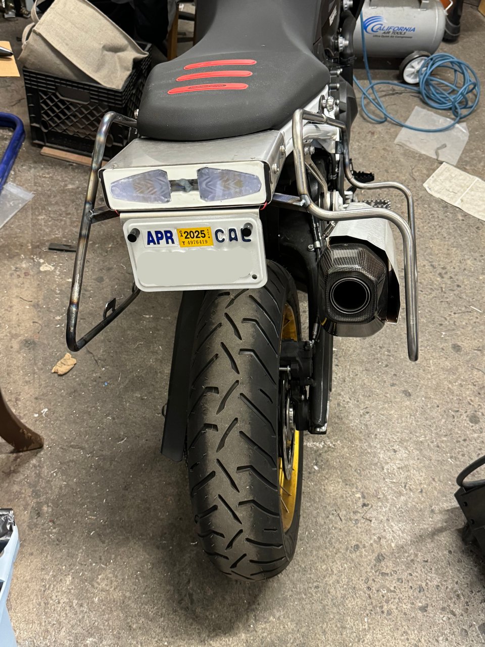 The rear of my motorcycle, with luggage racks installed.