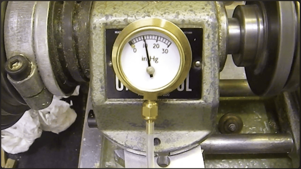 A vacuum gauge demonstrating the effectiveness of the pump.