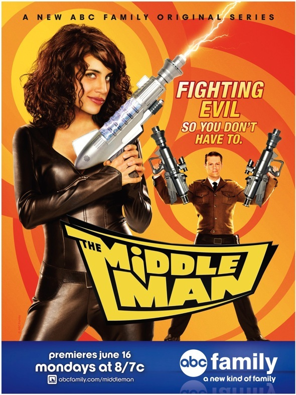 A poster for the obscurely beloved ABC Family series "The Middleman" starring Natalie Morales and Matt Keeslar as secret agents charged with fighting comic book evil in the real world. Tag line: Fighting evil, so you don't have to.