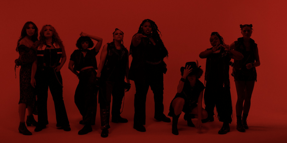 A dark red group shot of the all new Warriors.