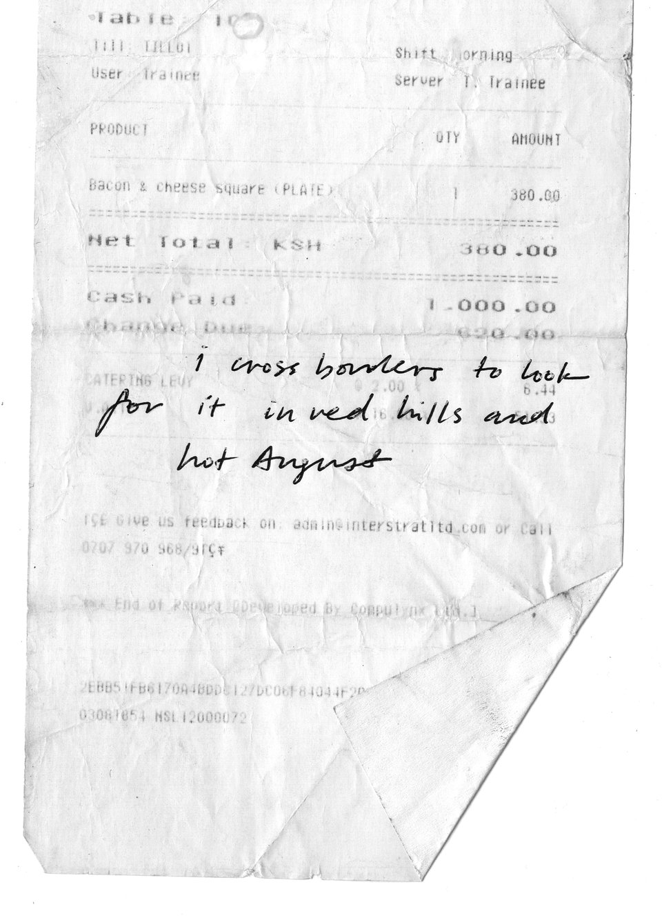 A crumpled then smoothed out receipt with handwritten in pen: i cross borders to look for it in red hills and hot August