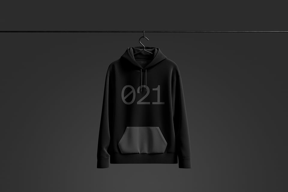 Dark hoodie with 021 printed on the front