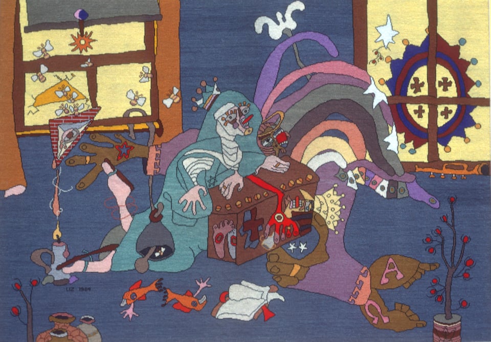 A needlepoint illustration of Mary draped over a wooden chest. A ribbon-like angel surrounds her. They are at the centre of a blue room. Bees fly in the air. An eye in a triangle weeps before a red brick wall. The feet of the angel bear the alpha and omega symbols. We are curious about what is in the box.