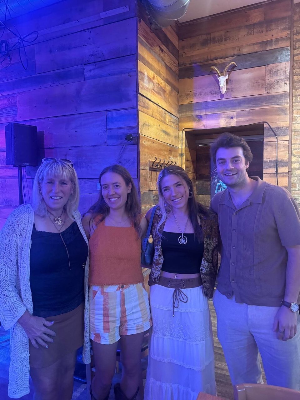 friends and me posing for a photo at uncommon ground before my show